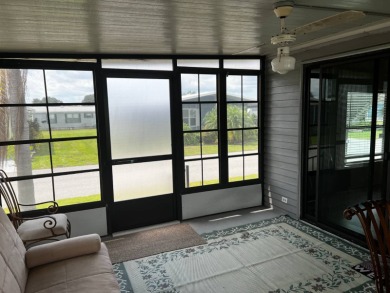 Community living in a great location with tons of activities in on Lake Henry Golf Club in Florida - for sale on GolfHomes.com, golf home, golf lot