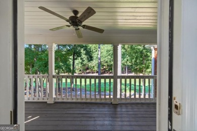 Charming Golf Cottage with Premier Location in Reynolds Lake on Reynolds Lake Oconee - The Oconee in Georgia - for sale on GolfHomes.com, golf home, golf lot