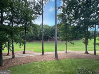 Charming Golf Cottage with Premier Location in Reynolds Lake on Reynolds Lake Oconee - The Oconee in Georgia - for sale on GolfHomes.com, golf home, golf lot