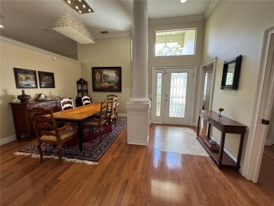One or more photo(s) has been virtually staged. One or more on University Park Country Club in Florida - for sale on GolfHomes.com, golf home, golf lot