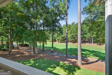 Charming Golf Cottage with Premier Location in Reynolds Lake on Reynolds Lake Oconee - The Oconee in Georgia - for sale on GolfHomes.com, golf home, golf lot