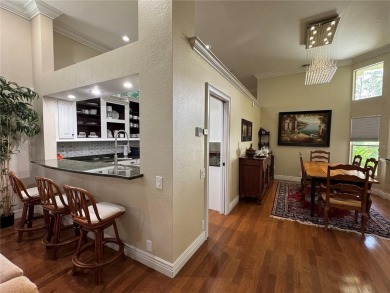 One or more photo(s) has been virtually staged. One or more on University Park Country Club in Florida - for sale on GolfHomes.com, golf home, golf lot