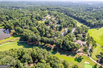 Charming Golf Cottage with Premier Location in Reynolds Lake on Reynolds Lake Oconee - The Oconee in Georgia - for sale on GolfHomes.com, golf home, golf lot