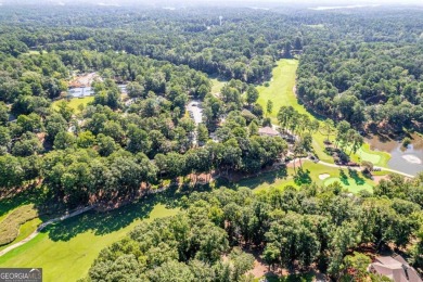 Charming Golf Cottage with Premier Location in Reynolds Lake on Reynolds Lake Oconee - The Oconee in Georgia - for sale on GolfHomes.com, golf home, golf lot