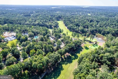 Charming Golf Cottage with Premier Location in Reynolds Lake on Reynolds Lake Oconee - The Oconee in Georgia - for sale on GolfHomes.com, golf home, golf lot
