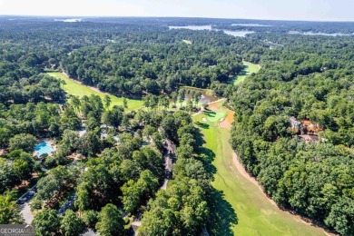 Charming Golf Cottage with Premier Location in Reynolds Lake on Reynolds Lake Oconee - The Oconee in Georgia - for sale on GolfHomes.com, golf home, golf lot