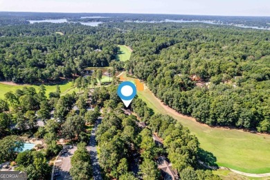 Charming Golf Cottage with Premier Location in Reynolds Lake on Reynolds Lake Oconee - The Oconee in Georgia - for sale on GolfHomes.com, golf home, golf lot