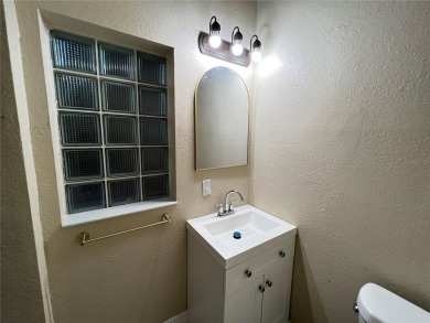 One or more photo(s) has been virtually staged. One or more on University Park Country Club in Florida - for sale on GolfHomes.com, golf home, golf lot