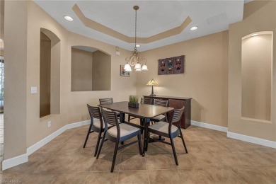 From the moment you drive into your two-car attached garage, you on The Colony Golf and Country Club in Florida - for sale on GolfHomes.com, golf home, golf lot
