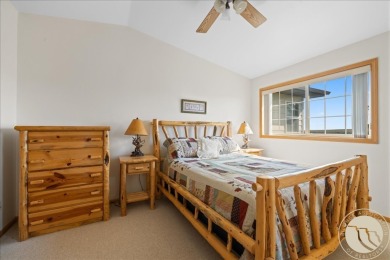 Kick back on the front deck or private upstairs balcony of this on Red Lodge Golf Club in Montana - for sale on GolfHomes.com, golf home, golf lot