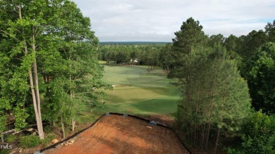 Introducing a luxurious dwelling nestled in the heart of the on Chapel Ridge Golf Club in North Carolina - for sale on GolfHomes.com, golf home, golf lot