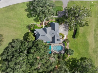 Under contract-accepting backup offers. Stunning custom home on Turkey Creek Golf and Country Club in Florida - for sale on GolfHomes.com, golf home, golf lot