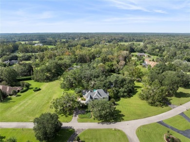 Under contract-accepting backup offers. Stunning custom home on Turkey Creek Golf and Country Club in Florida - for sale on GolfHomes.com, golf home, golf lot