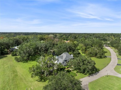 Under contract-accepting backup offers. Stunning custom home on Turkey Creek Golf and Country Club in Florida - for sale on GolfHomes.com, golf home, golf lot