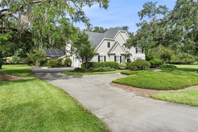 Under contract-accepting backup offers. Stunning custom home on Turkey Creek Golf and Country Club in Florida - for sale on GolfHomes.com, golf home, golf lot