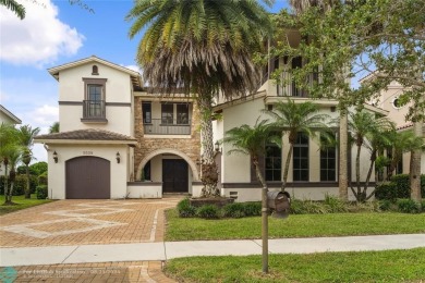 Nestled in the prestigious Parkland Golf and Country Club, this on Parkland Golf Club in Florida - for sale on GolfHomes.com, golf home, golf lot