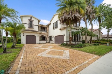 Nestled in the prestigious Parkland Golf and Country Club, this on Parkland Golf Club in Florida - for sale on GolfHomes.com, golf home, golf lot