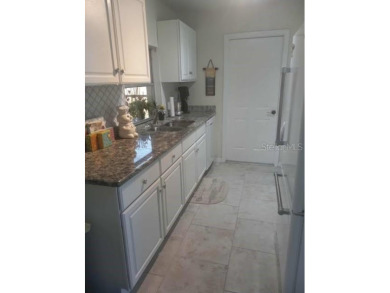 Updated and lovely home in a centrally located 55+ golf on River Isles Golf Club in Florida - for sale on GolfHomes.com, golf home, golf lot
