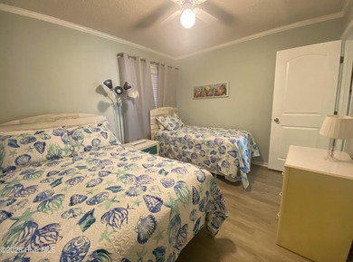 Oceanview Top-Floor Condo at A Place at the Beach - Your Coastal on The Country Club of the Crystal Coast in North Carolina - for sale on GolfHomes.com, golf home, golf lot