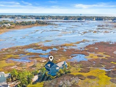 Nestled on approximately 1.4 acres at the end of a quiet on Members Club At St. James Plantation in North Carolina - for sale on GolfHomes.com, golf home, golf lot