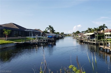 BEAUTIFUL OVERSIZED 0.31 ACRE  SOUTHERN EXPOSURE WATERFRONT LOT on Royal Tee Country Club in Florida - for sale on GolfHomes.com, golf home, golf lot