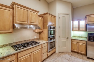 Welcome to your dream home in the highly desirable Residential on London Bridge Golf Course in Arizona - for sale on GolfHomes.com, golf home, golf lot