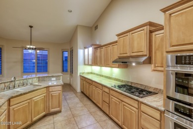 Welcome to your dream home in the highly desirable Residential on London Bridge Golf Course in Arizona - for sale on GolfHomes.com, golf home, golf lot