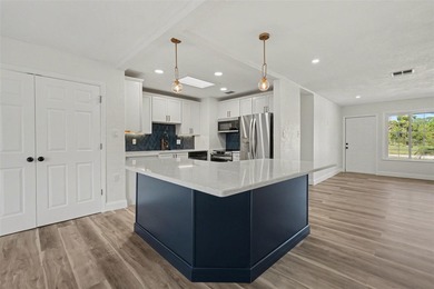 Some photos are Virtually Staged. Refined Coastal Elegance of on St. Petersburg Country Club in Florida - for sale on GolfHomes.com, golf home, golf lot