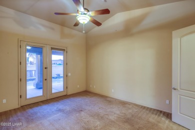 Welcome to your dream home in the highly desirable Residential on London Bridge Golf Course in Arizona - for sale on GolfHomes.com, golf home, golf lot