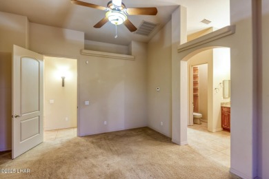 Welcome to your dream home in the highly desirable Residential on London Bridge Golf Course in Arizona - for sale on GolfHomes.com, golf home, golf lot