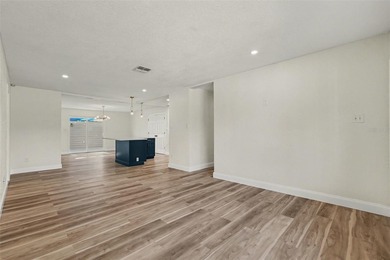 Some photos are Virtually Staged. Refined Coastal Elegance of on St. Petersburg Country Club in Florida - for sale on GolfHomes.com, golf home, golf lot