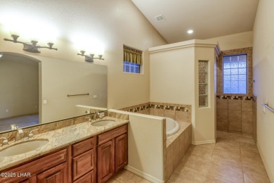 Welcome to your dream home in the highly desirable Residential on London Bridge Golf Course in Arizona - for sale on GolfHomes.com, golf home, golf lot