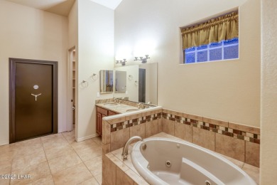 Welcome to your dream home in the highly desirable Residential on London Bridge Golf Course in Arizona - for sale on GolfHomes.com, golf home, golf lot