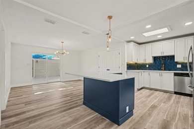 Some photos are Virtually Staged. Refined Coastal Elegance of on St. Petersburg Country Club in Florida - for sale on GolfHomes.com, golf home, golf lot