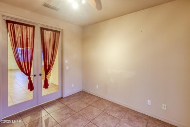 Welcome to your dream home in the highly desirable Residential on London Bridge Golf Course in Arizona - for sale on GolfHomes.com, golf home, golf lot