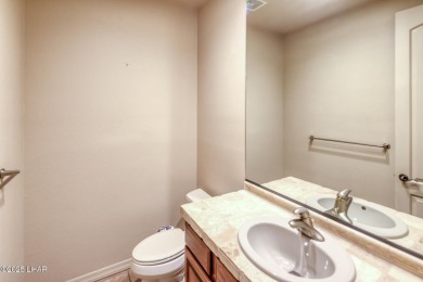 Welcome to your dream home in the highly desirable Residential on London Bridge Golf Course in Arizona - for sale on GolfHomes.com, golf home, golf lot