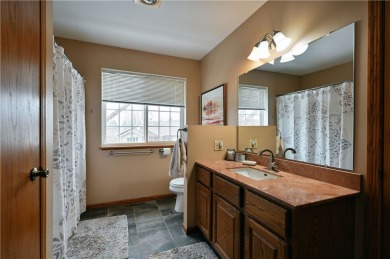 This beautifully maintained 3 bed, 2 bath home on the edge of on Rolling Oaks Golf Course in Wisconsin - for sale on GolfHomes.com, golf home, golf lot