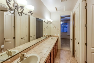 Welcome to your dream home in the highly desirable Residential on London Bridge Golf Course in Arizona - for sale on GolfHomes.com, golf home, golf lot