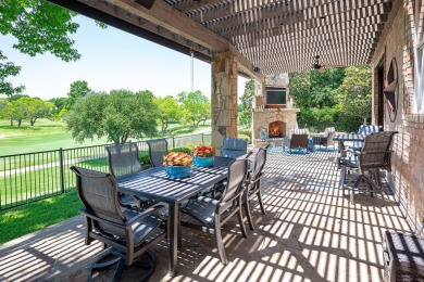 Prepare to be captivated by breathtaking golf and water vistas on Hackberry Creek Country Club in Texas - for sale on GolfHomes.com, golf home, golf lot