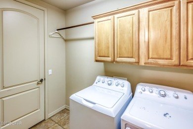 Welcome to your dream home in the highly desirable Residential on London Bridge Golf Course in Arizona - for sale on GolfHomes.com, golf home, golf lot