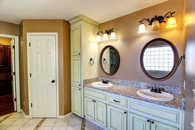 NEW ROOF This lovely two-story brick home is located in The on Highland Oaks Golf Course in Alabama - for sale on GolfHomes.com, golf home, golf lot