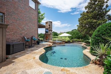 Prepare to be captivated by breathtaking golf and water vistas on Hackberry Creek Country Club in Texas - for sale on GolfHomes.com, golf home, golf lot