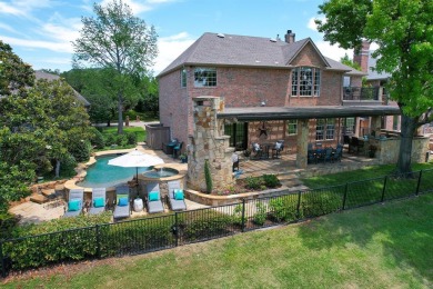 Prepare to be captivated by breathtaking golf and water vistas on Hackberry Creek Country Club in Texas - for sale on GolfHomes.com, golf home, golf lot