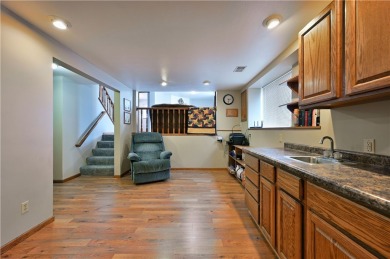 This beautifully maintained 3 bed, 2 bath home on the edge of on Rolling Oaks Golf Course in Wisconsin - for sale on GolfHomes.com, golf home, golf lot