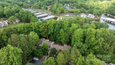 Enjoy peaceful living in this four-bed, three-bath townhome on River Hills Country Club in South Carolina - for sale on GolfHomes.com, golf home, golf lot