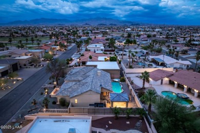 Welcome to your dream home in the highly desirable Residential on London Bridge Golf Course in Arizona - for sale on GolfHomes.com, golf home, golf lot