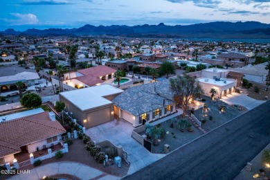 Welcome to your dream home in the highly desirable Residential on London Bridge Golf Course in Arizona - for sale on GolfHomes.com, golf home, golf lot