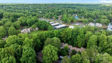Enjoy peaceful living in this four-bed, three-bath townhome on River Hills Country Club in South Carolina - for sale on GolfHomes.com, golf home, golf lot