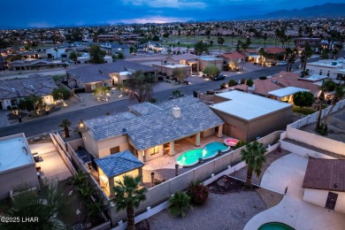 Welcome to your dream home in the highly desirable Residential on London Bridge Golf Course in Arizona - for sale on GolfHomes.com, golf home, golf lot