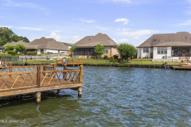 New Waterfront Listing on Camden Lake - Lake CarolineBeautifully on Lake Caroline Golf Club in Mississippi - for sale on GolfHomes.com, golf home, golf lot